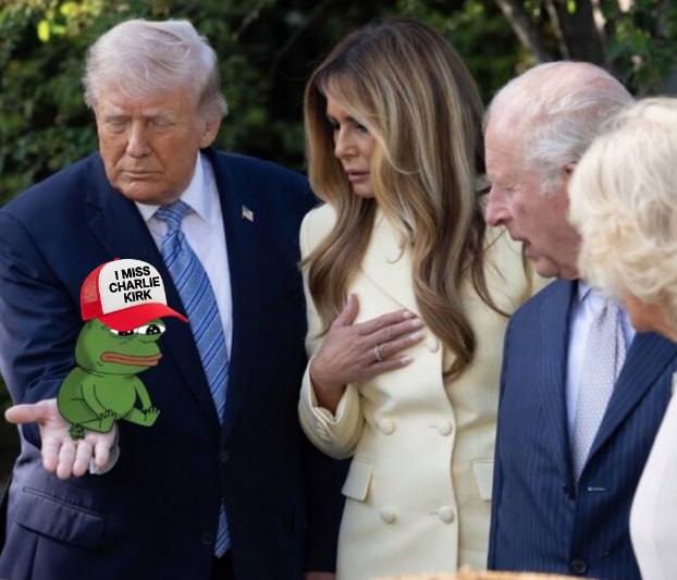 Pepe wearing a MAGA hat sitting in his hand
